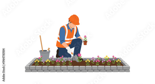 A worker in an orange hard hat and safety vest kneels, planting pink flowers into a long raised garden bed with a trowel.