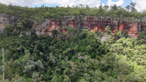 Aerial view of Cania Gorge sandstone cliffs and forest landscape in Queensland