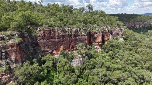Aerial view of Cania Gorge sandstone cliffs and forest landscape in Queensland
