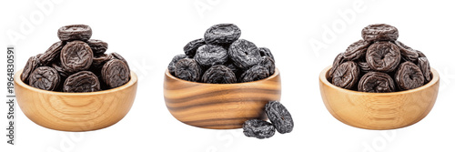Quadro su tela Dried plums in wooden bowl isolated on white background, Prunus domestica prunes