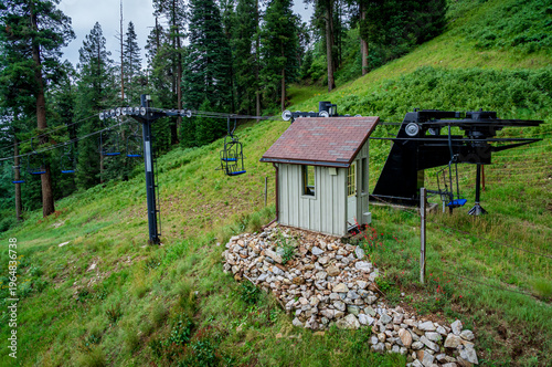 Ski lift in the clouds and fog on a summer day in the Santa Catalina Mountains near Tucson Arizona
