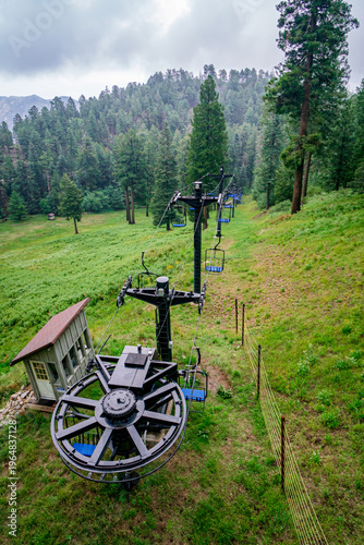 Ski lift in the clouds and fog on a summer day in the Santa Catalina Mountains near Tucson Arizona