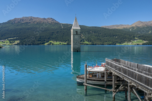Bilde på lerret Reschen See - Reschen Lake - Lago di Resia - Tower of the sunken village of Graun
