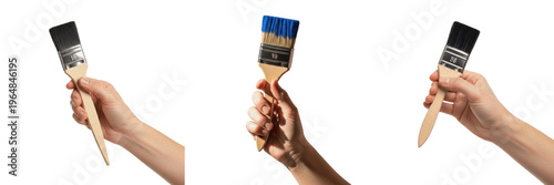 Schilderij op canvas Set of hands holding different paint brushes with wooden handles, professional d