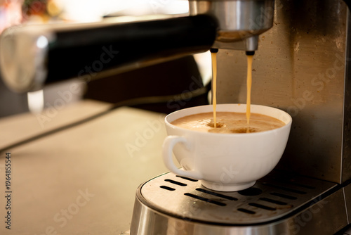 espresso machine pouring coffee