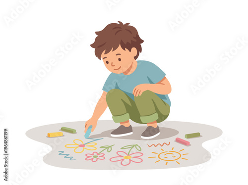 Young boy drawing with chalk on pavement.
