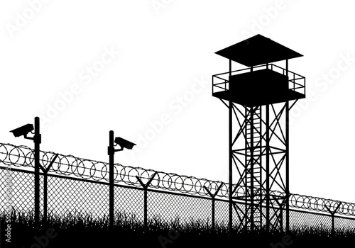 Silhouette of a High Security Prison Guard Watchtower and Barbed Wire Fence with Surveillance Cameras