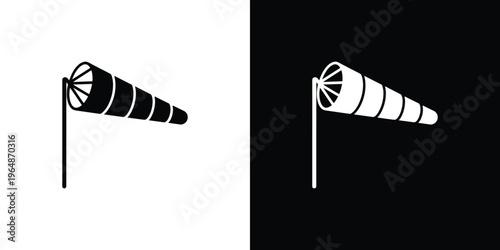 Black and white wind sock on pole weather