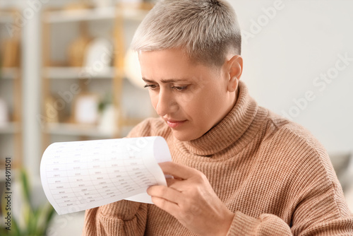 Mature woman in debt with p...