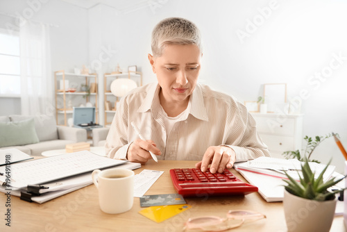 Mature woman in debt using ...