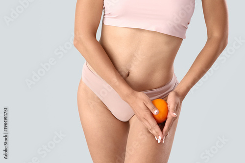 Young woman in underwear wi...