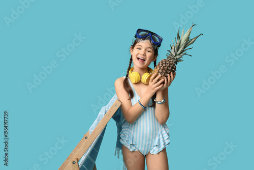 Cute girl in swimsuit with ...