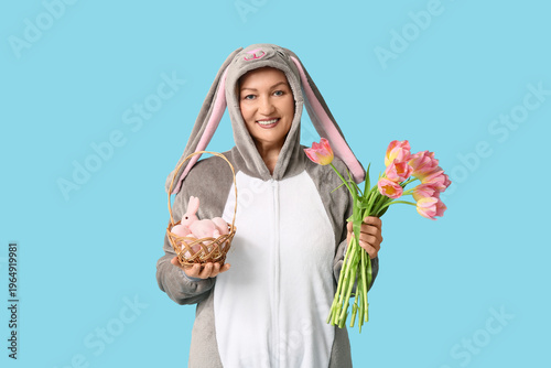 Funny senior woman in bunny...