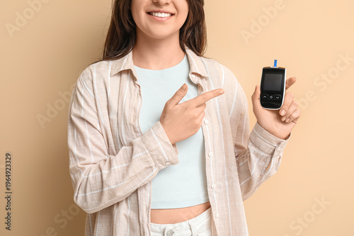 Diabetic young woman pointi...