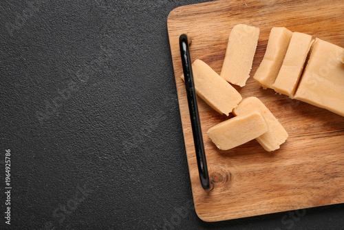 Wooden board with tasty mar...