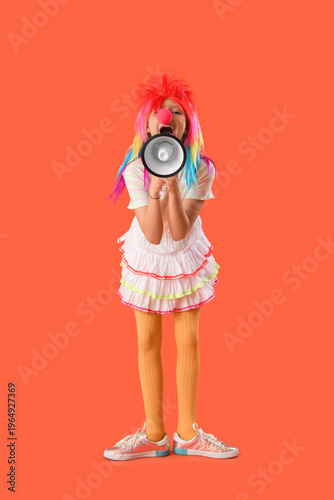 Funny girl in clown costume...