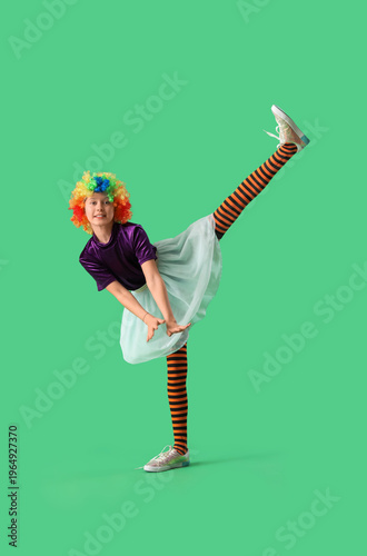 Funny girl in clown costume...