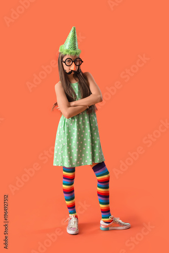 Funny girl in party hat and...