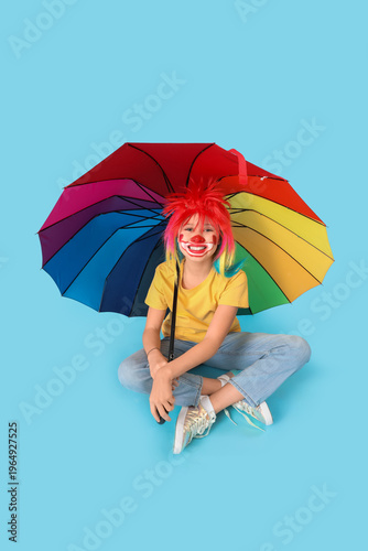 Funny girl in clown costume...