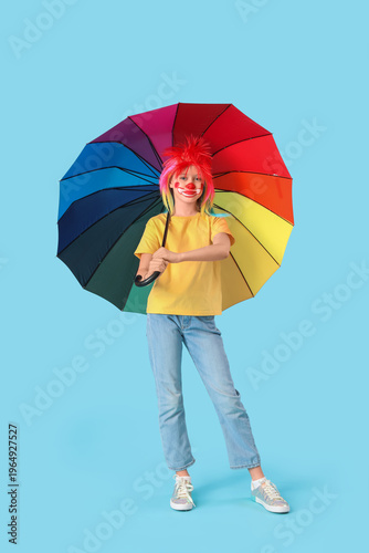 Funny girl in clown costume...