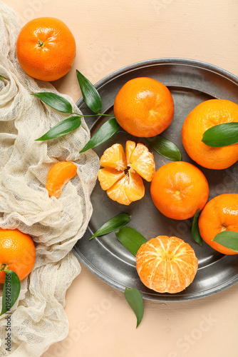 Plate with sweet mandarins ...