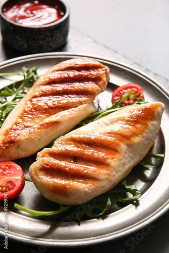 Plate of tasty grilled chic...