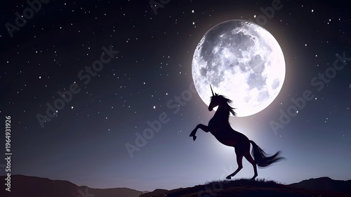 A majestic unicorn rearing up on a hill silhouetted