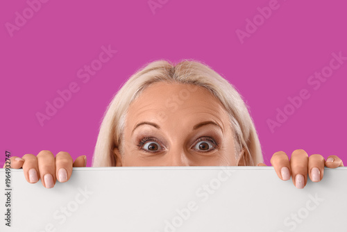 Thoughtful mature woman wit...
