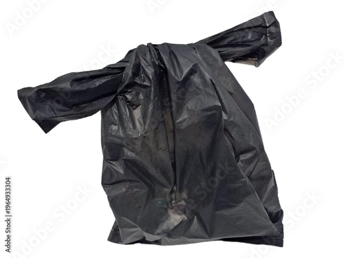 Used black plastic singlet bag isolated on white background for recycling waste management and pollution concept