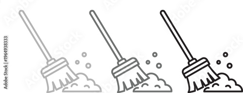 Three brooms with varying shades of cleanliness