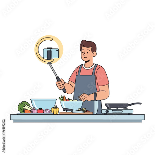 Young Man Cooking and Filming Tutorial with Selfie Stick and Ring Light