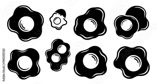 Collection of abstract black blob shapes with white centers
