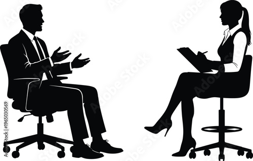 Business meeting with man and woman in silhouette discussing work.
