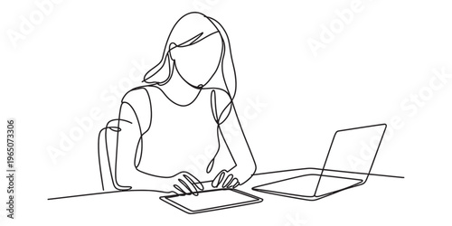 A continuous line drawing of a woman working at a desk with a laptop and a digital tablet device. Vector, illustration
