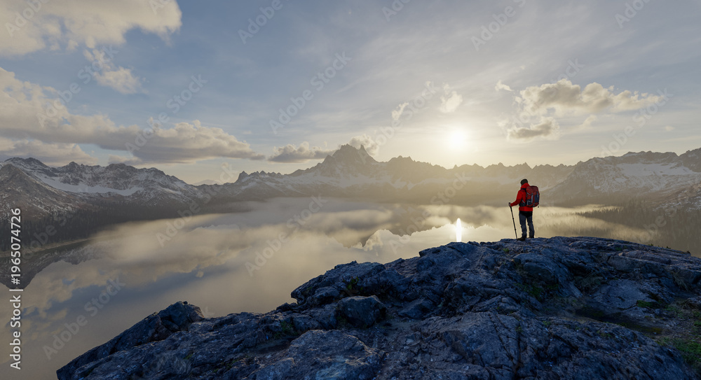 Obraz premium Hiker Overlooking Misty Mountain Lake At Sunrise With Backpack And Trekking Poles — 3D Rendering