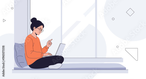 Young woman working on laptop at home, sitting by window, casual lifestyle