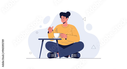 Person enjoying coffee break, sitting cross-legged with a cup.