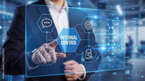 Businessman interacting with internal control interface on transparent screen