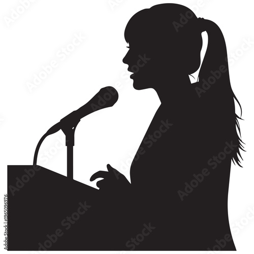Woman speaking into a microphone at a podium silhouette