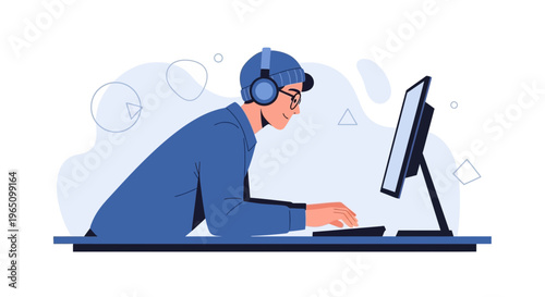 Young man wearing headphones and glasses, typing on a computer, focused on work or study