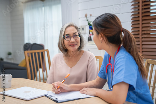 Obraz na plátne Healthcare consultation home setting portrait photography warm environment engag