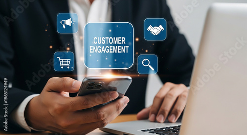 Digital Customer Engagement: A professional individual is immersed in the digital realm, utilizing a mobile phone and laptop to cultivate and refine customer engagement.