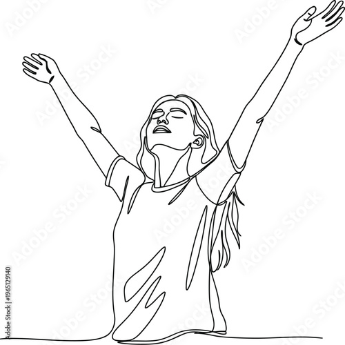 Joyful young woman with arms raised in celebration and triumph