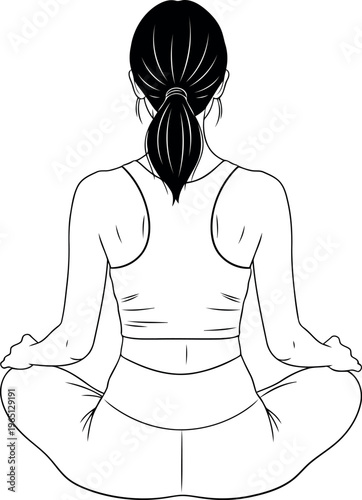 Woman in lotus pose meditating with braided hair and athletic wear