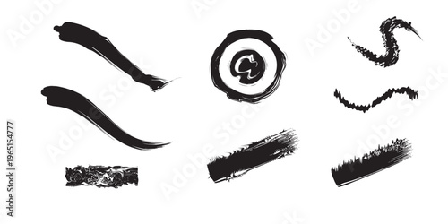 Collection of abstract black ink strokes and shapes on white background