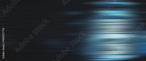 Abstract background with horizontal motion blur effect and blue light streaks on a dark textured surface