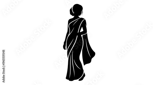 A woman in a sari walking away from the viewer