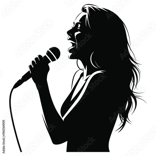 Beautiful female singer performing emotional ballad song into professional vocal microphone with long flowing hair during live music concert