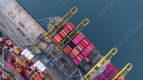 Aerial view Container cargo ship loading unloading container import export sea port, Global trade business container cargo ship freight shipping commercial trade logistic transportation international.