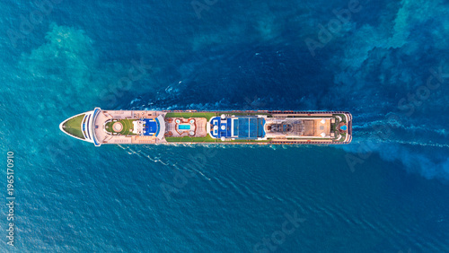 Aerial view of cruise boat at blue sea.